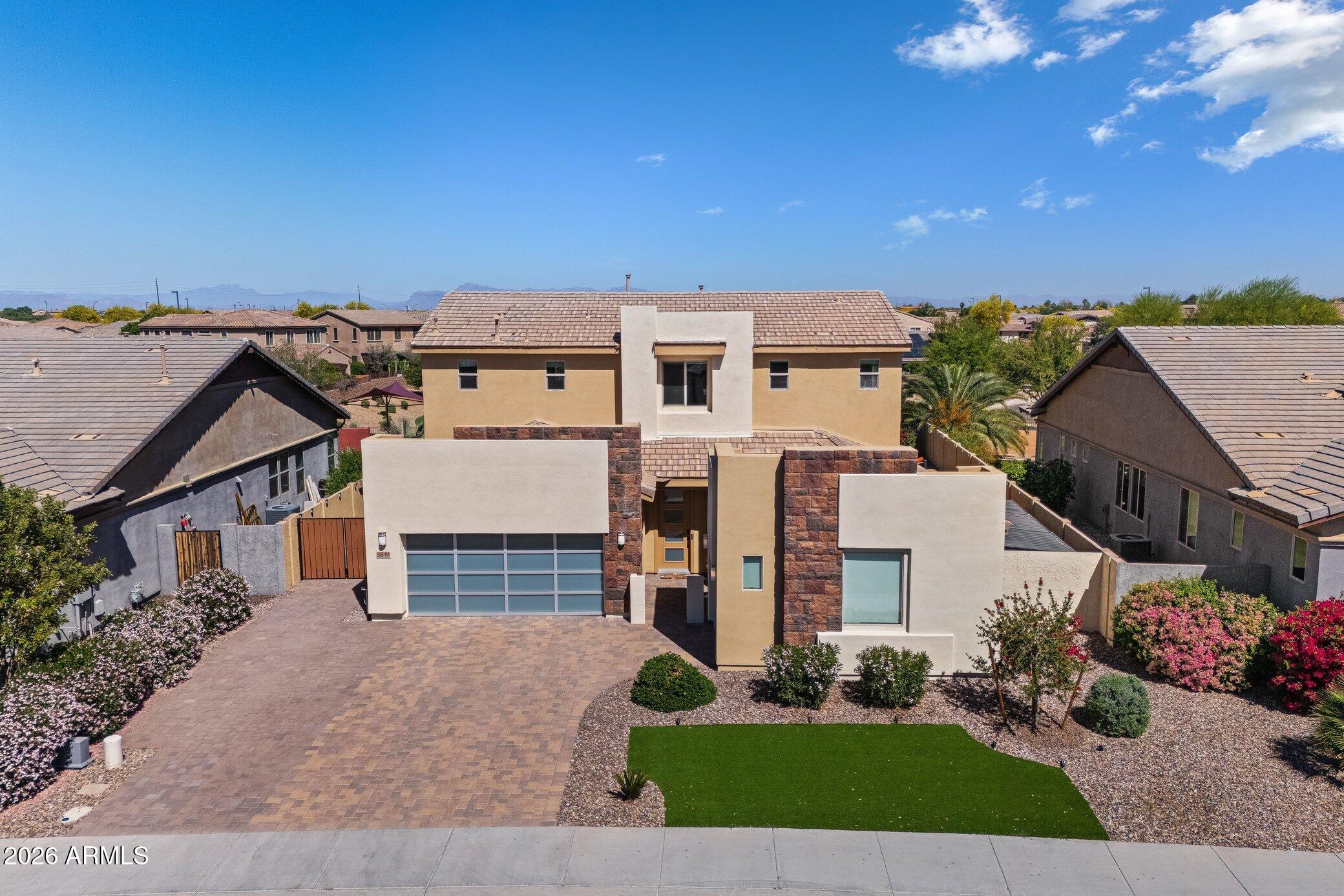5819 South Wilson Way Gilbert, AZ 85298 - Photo 65 of 76 front view of house with a yard