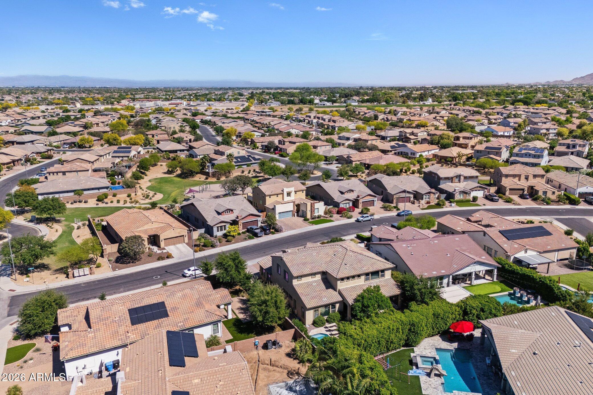 5819 South Wilson Way Gilbert, AZ 85298 - Photo 70 of 76 an aerial view of residential houses with outdoor space