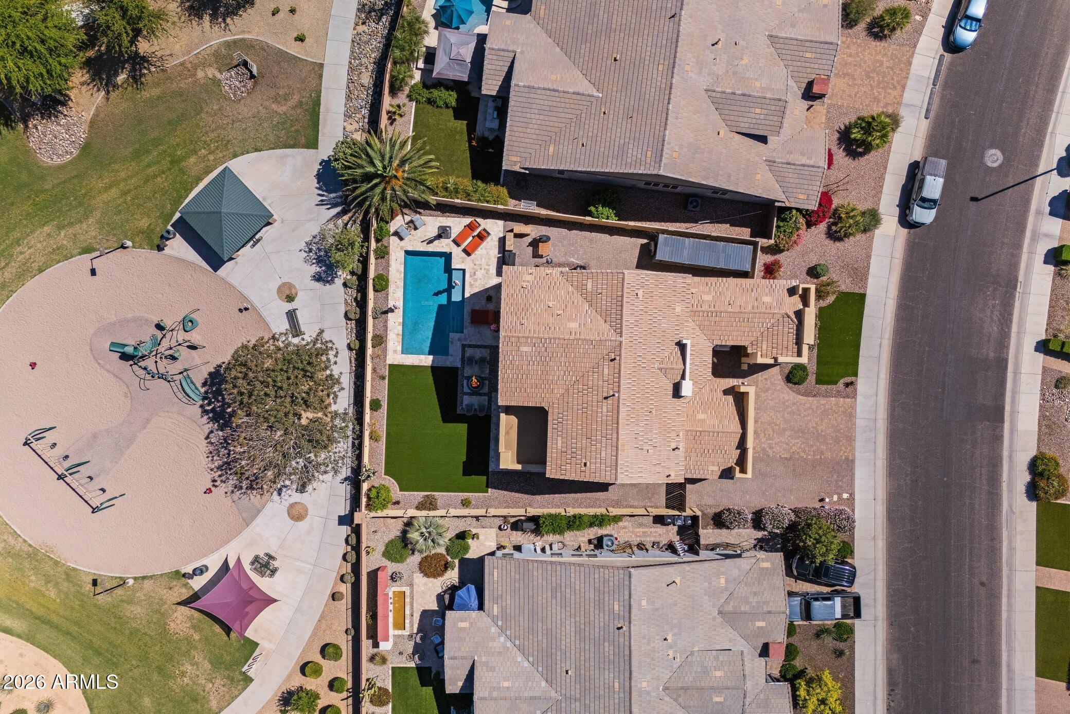 5819 South Wilson Way Gilbert, AZ 85298 - Photo 71 of 76 an aerial view of residential houses with outdoor space
