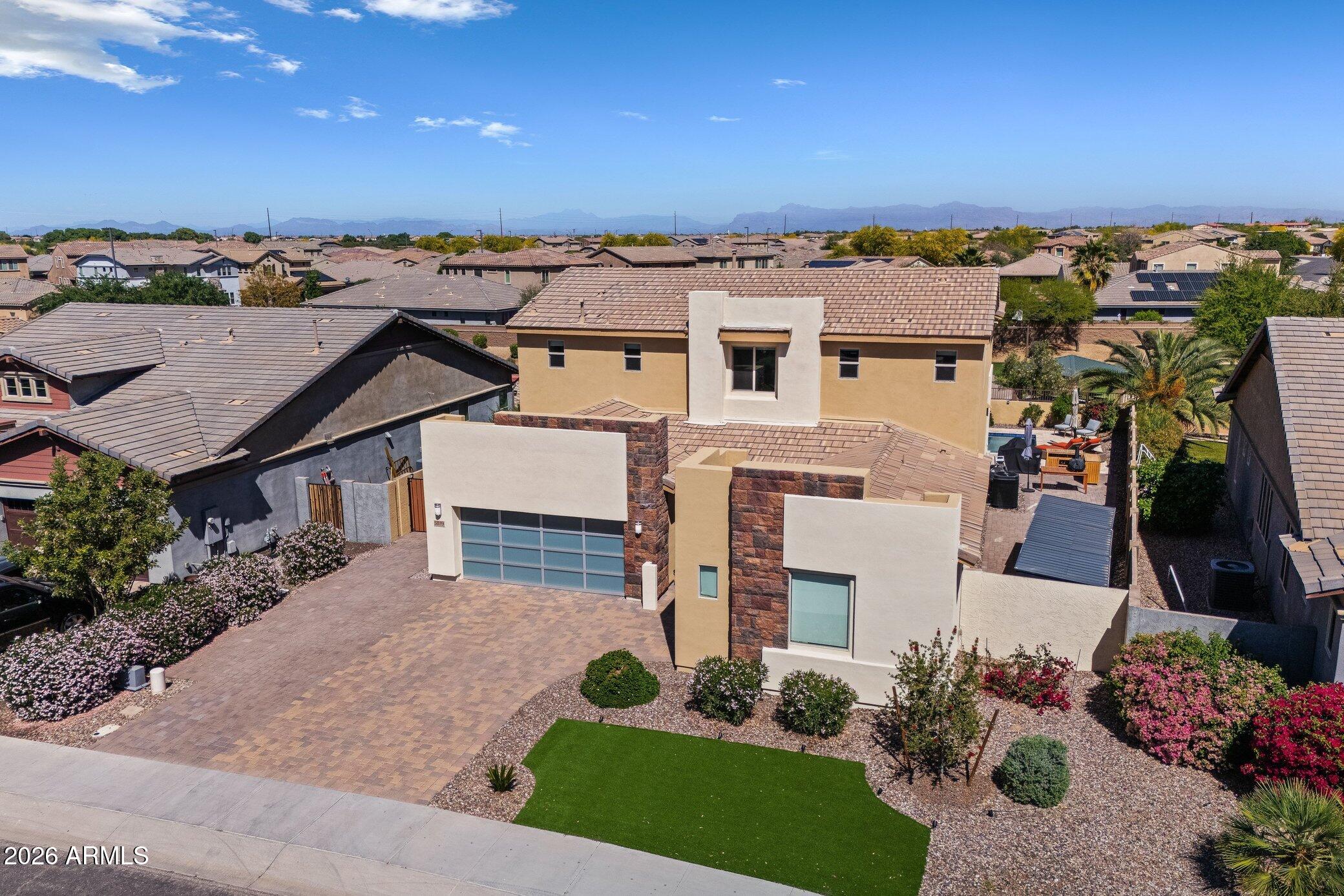 5819 South Wilson Way Gilbert, AZ 85298 - Photo 73 of 76 an aerial view of a house with a yard
