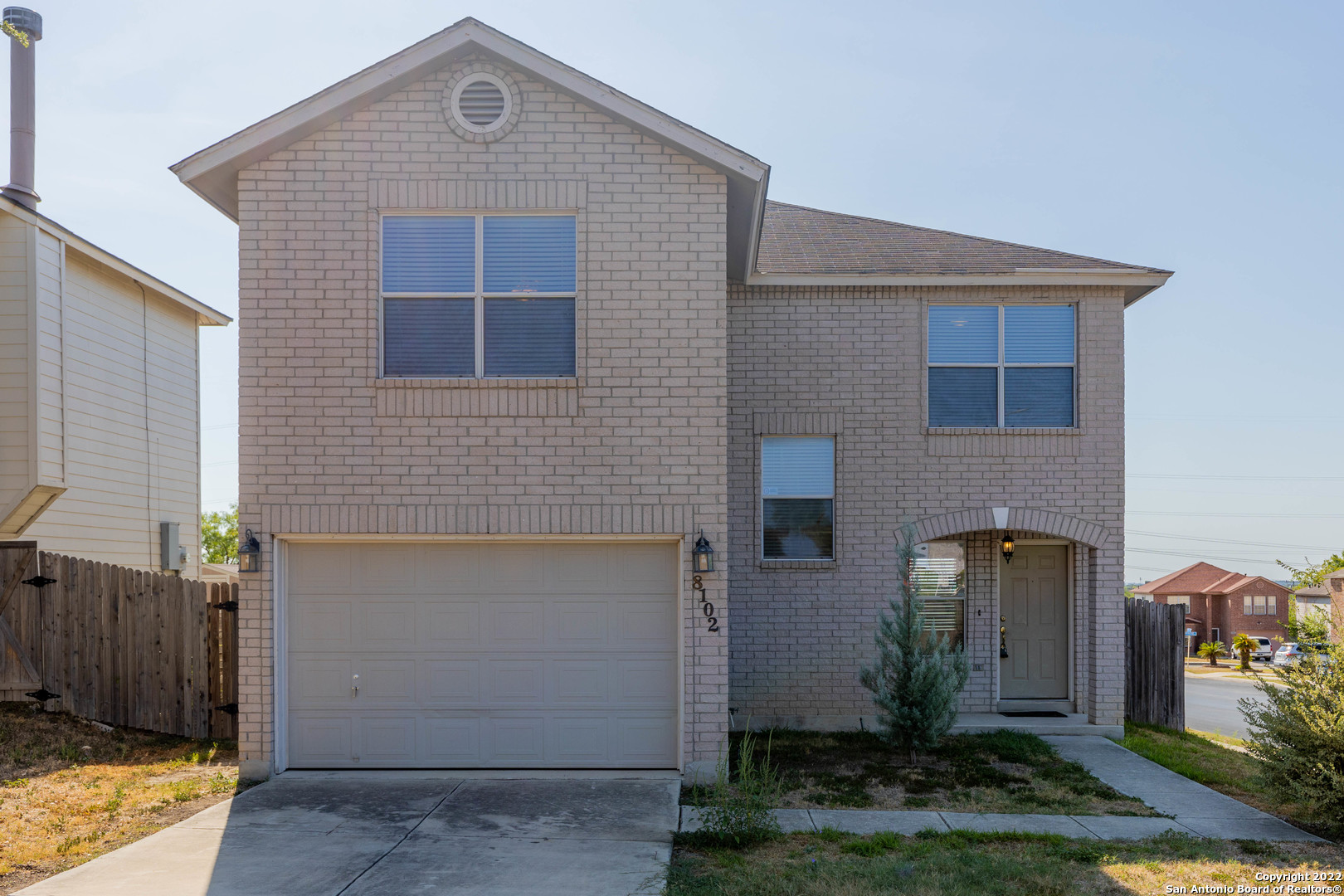 8102 Laguna Palm San Antonio, TX 78254 - Photo 1 of 1 a front view of a house with garden