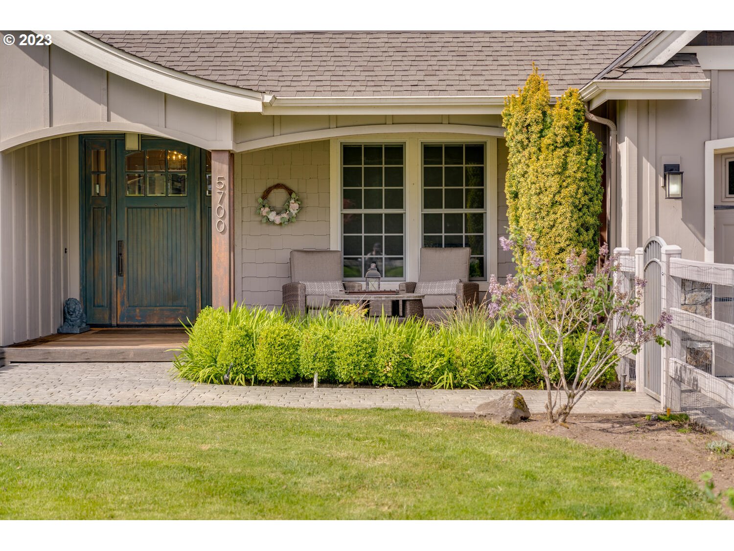 5700 Northwest 304th Street Ridgefield, WA 98642 - Photo 3 of 37 a front view of a house with garden