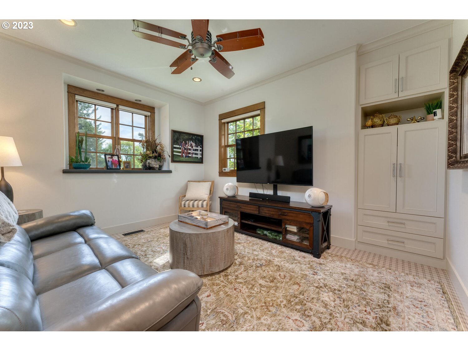 5700 Northwest 304th Street Ridgefield, WA 98642 - Photo 5 of 37 a living room with furniture and a flat screen tv