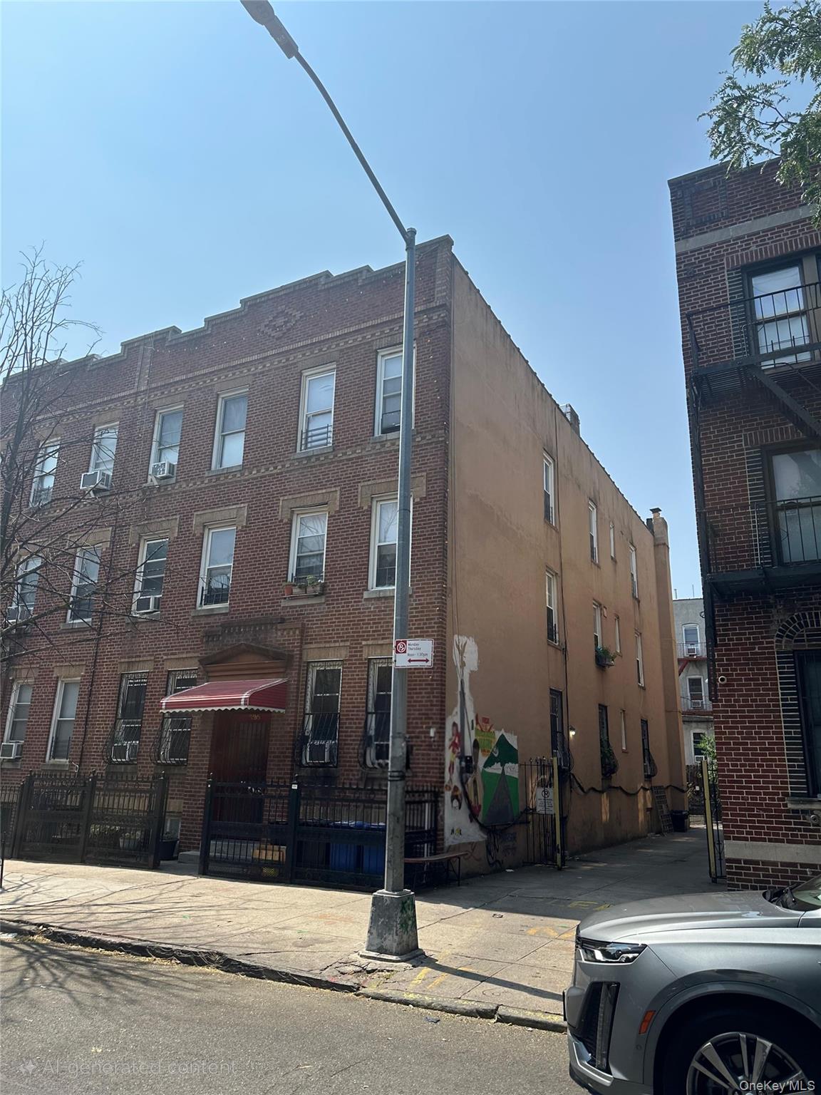 295 Schaefer Street Brooklyn, NY 11237 - Photo 2 of 9 a front view of a building with street