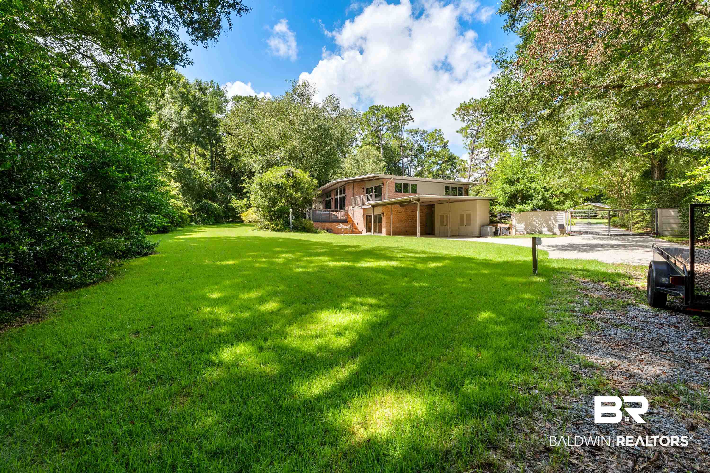 233 Suzanne Circle Mobile, AL 36608 - Photo 52 of 85 View of green lawn with a wooden deck
