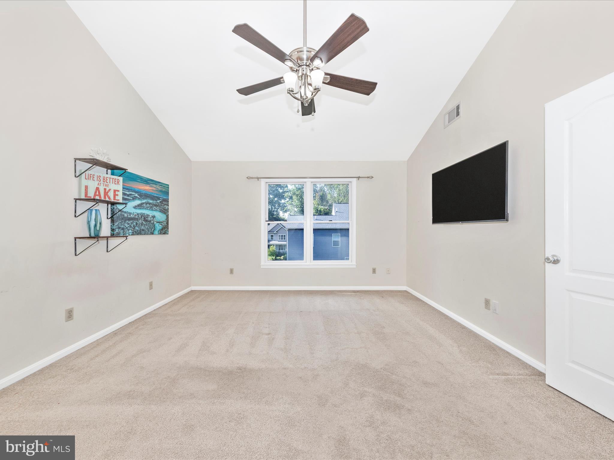 10632 Old Barn Road New Market, MD 21774 - Photo 25 of 76 an empty room with windows and ceiling fan