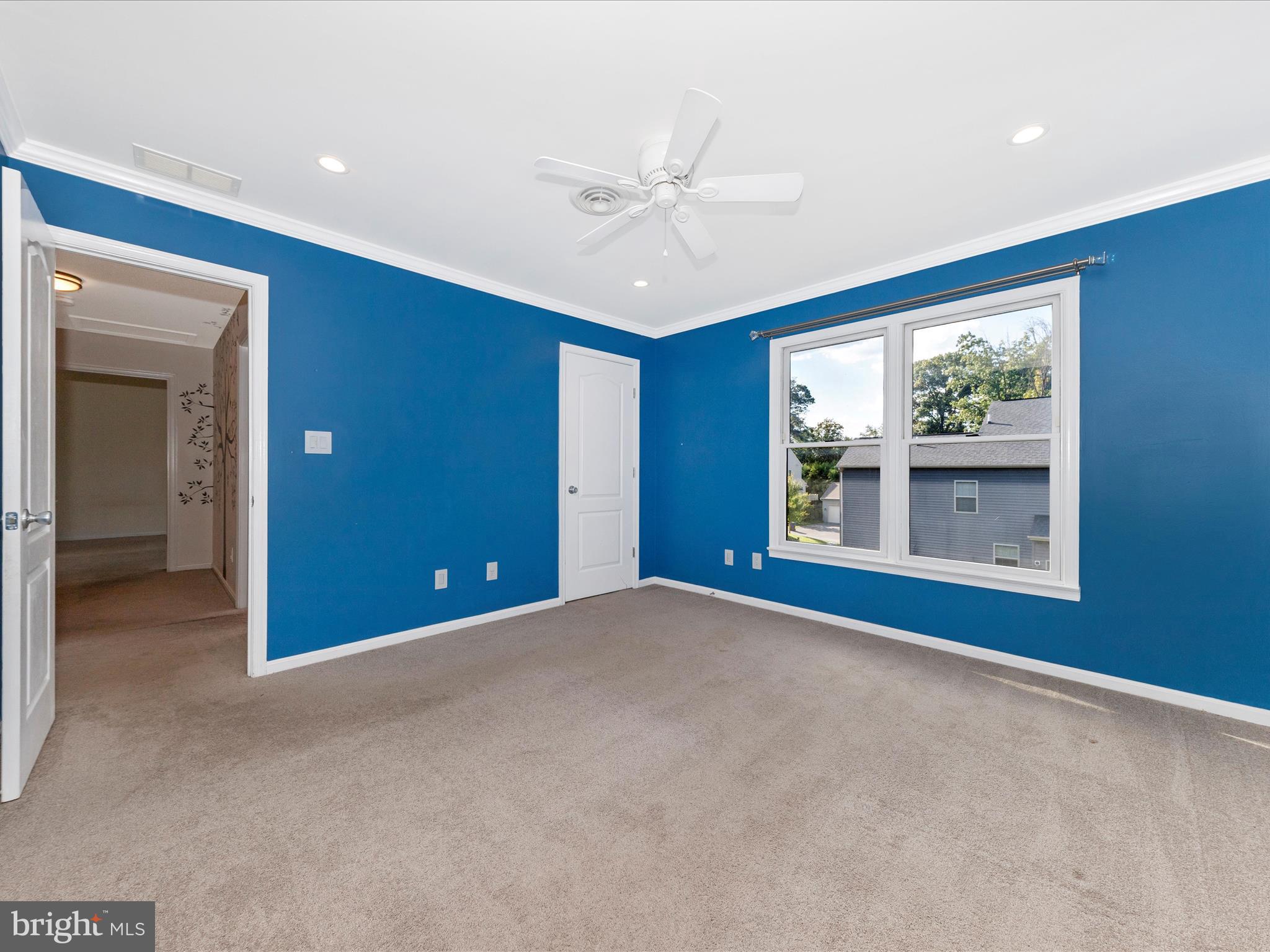 10632 Old Barn Road New Market, MD 21774 - Photo 32 of 76 a view of an empty room with window and cabinet