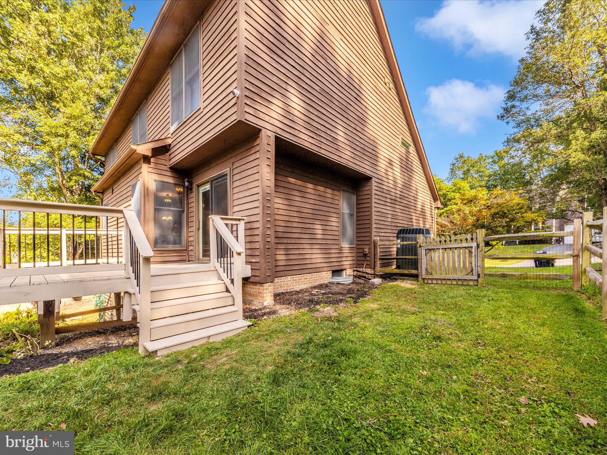 10632 Old Barn Road New Market, MD 21774 - Photo 51 of 76 a view of a house with a yard and sitting area