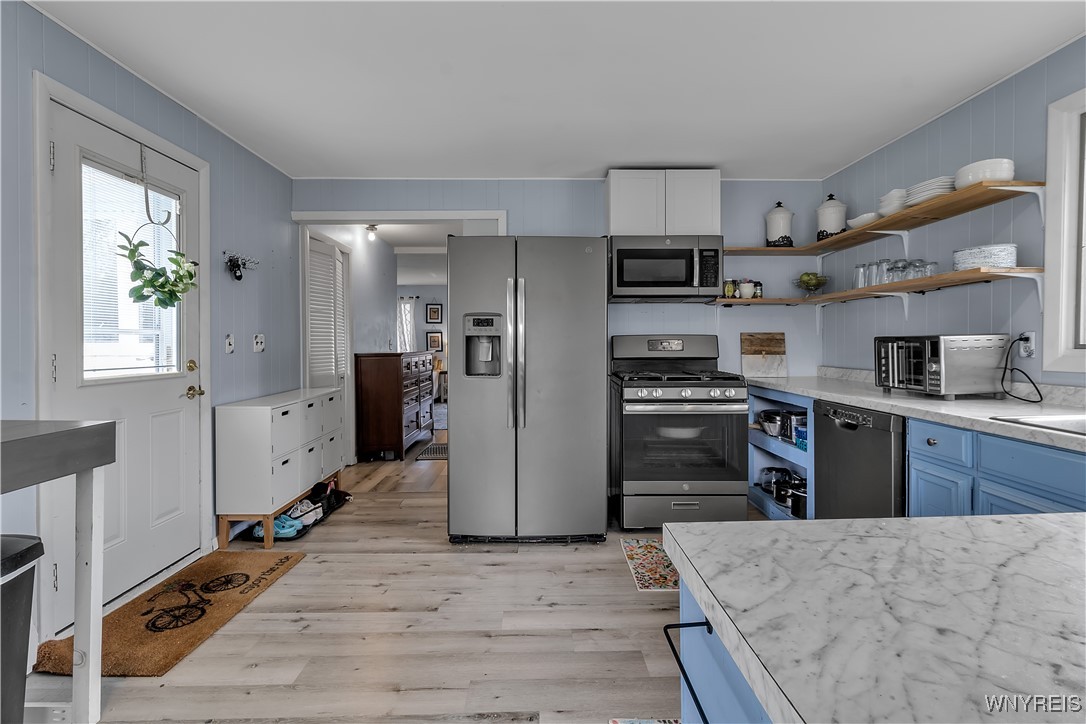 427 Herr Road Evans, NY 14006 - Photo 10 of 30 Kitchen & Door to Deck