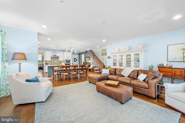a large kitchen with cabinets and stainless steel appliances