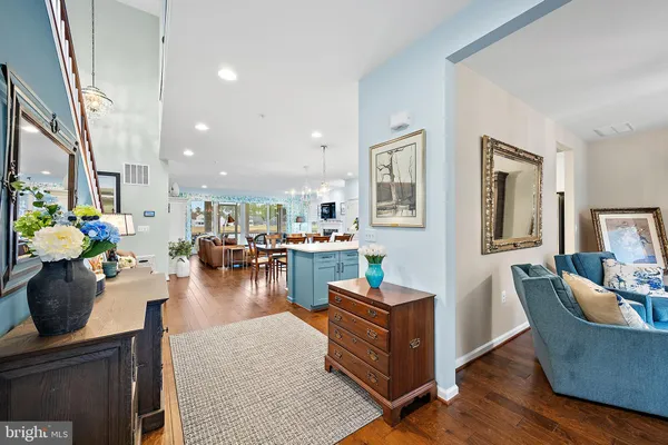 a living room with furniture fireplace and flat screen tv