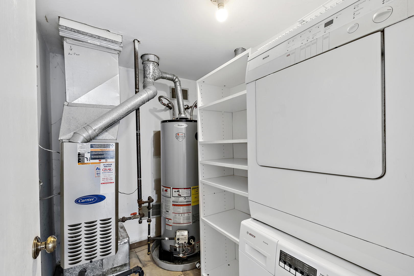 1021 Perry Drive Algonquin, IL 60102 - Photo 14 of 18 a bathroom with a shower and a mirror