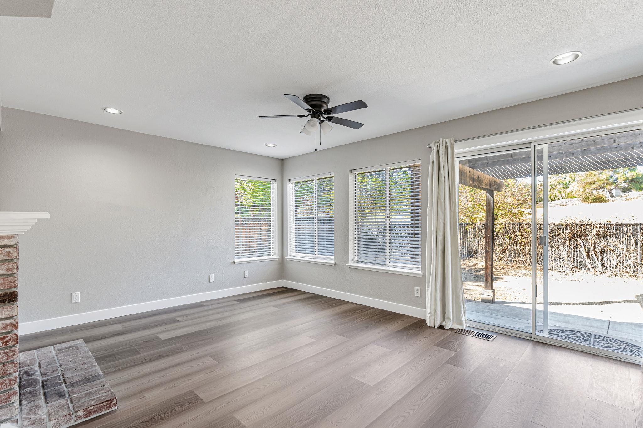 5052 Perry Way Antioch, CA 94531 - Photo 16 of 51 Unfurnished room featuring light wood-type flooring, recessed lighting, ceiling fan, and a textured ceiling