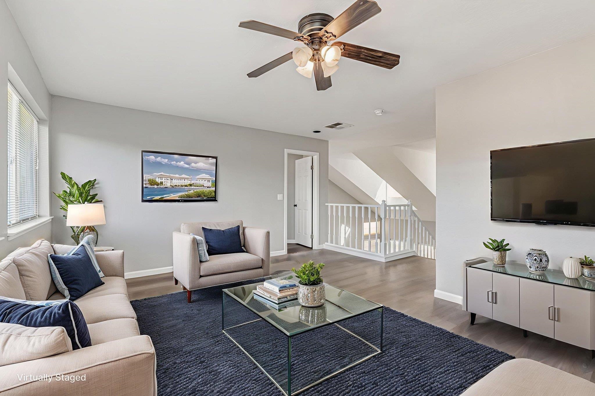 5052 Perry Way Antioch, CA 94531 - Photo 17 of 51 Living room with healthy amount of natural light, wood finished floors, and a ceiling fan