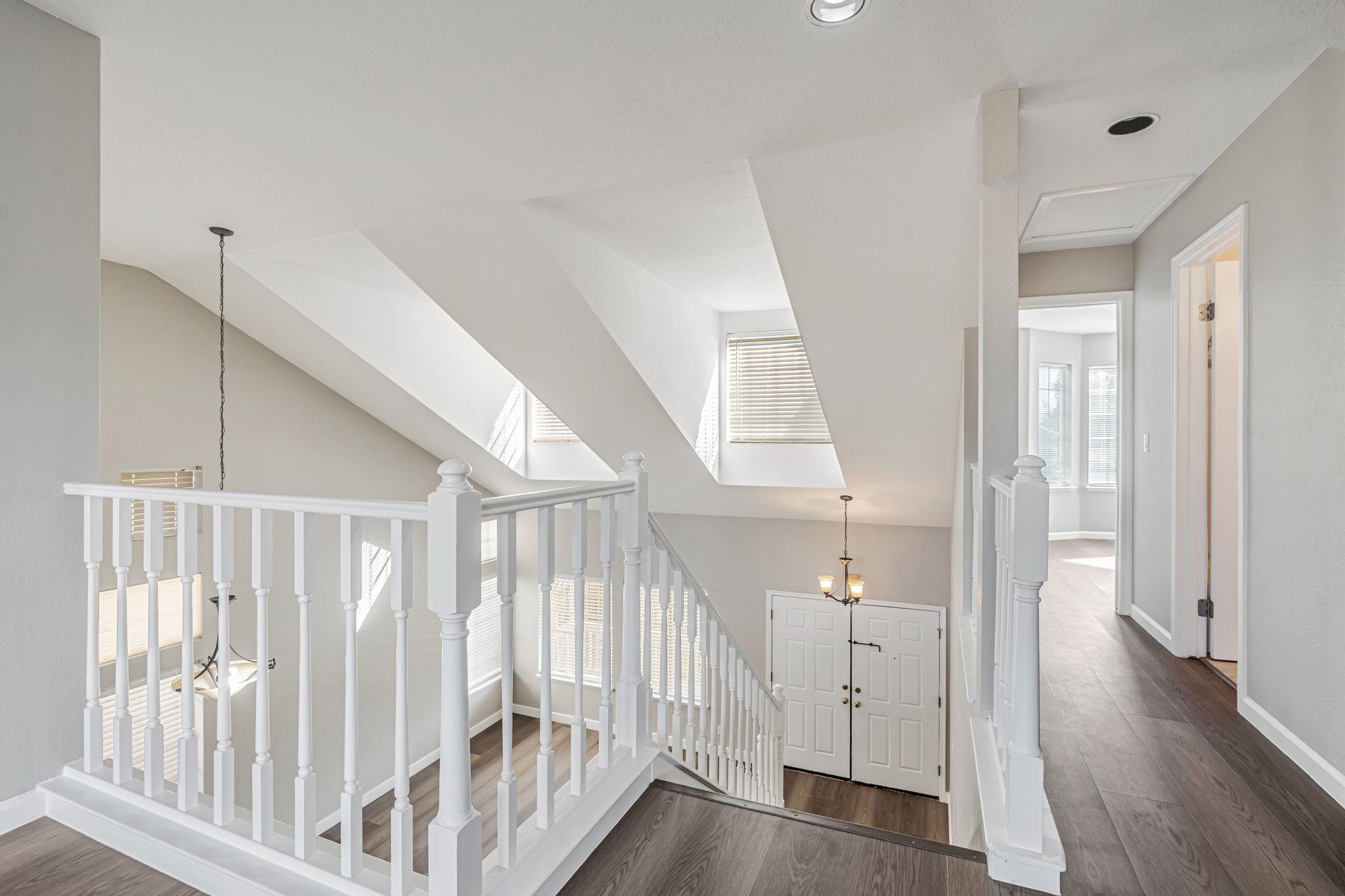 5052 Perry Way Antioch, CA 94531 - Photo 21 of 51 Staircase with wood finished floors and a chandelier