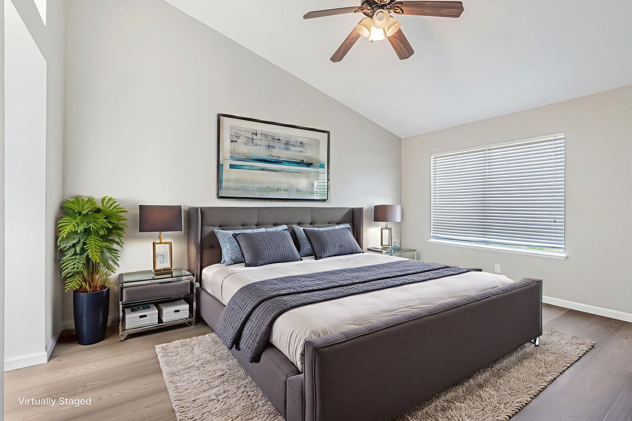 5052 Perry Way Antioch, CA 94531 - Photo 23 of 51 Bedroom featuring lofted ceiling, wood finished floors, and ceiling fan