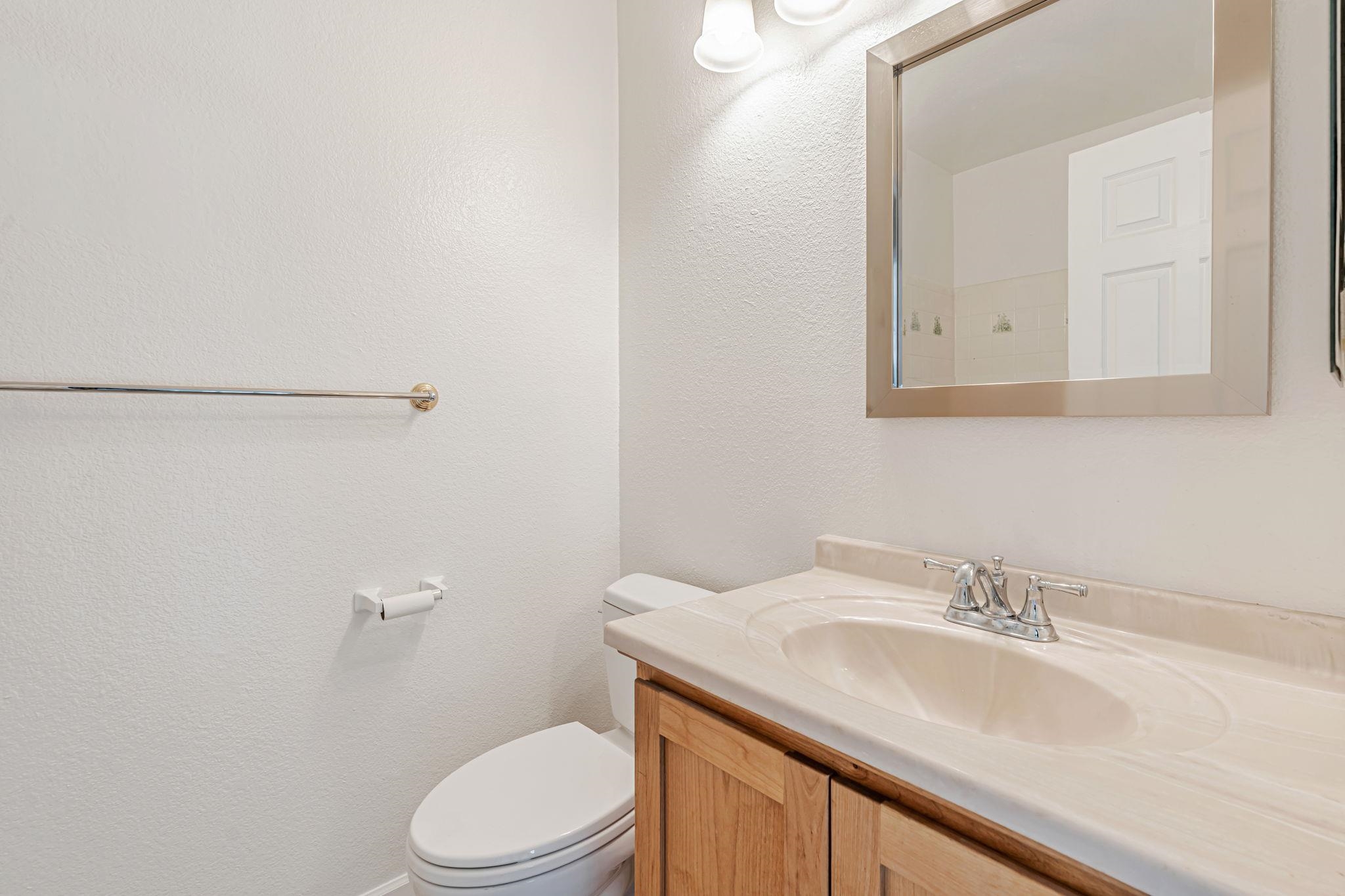 5052 Perry Way Antioch, CA 94531 - Photo 26 of 51 Half bathroom featuring a textured wall and vanity