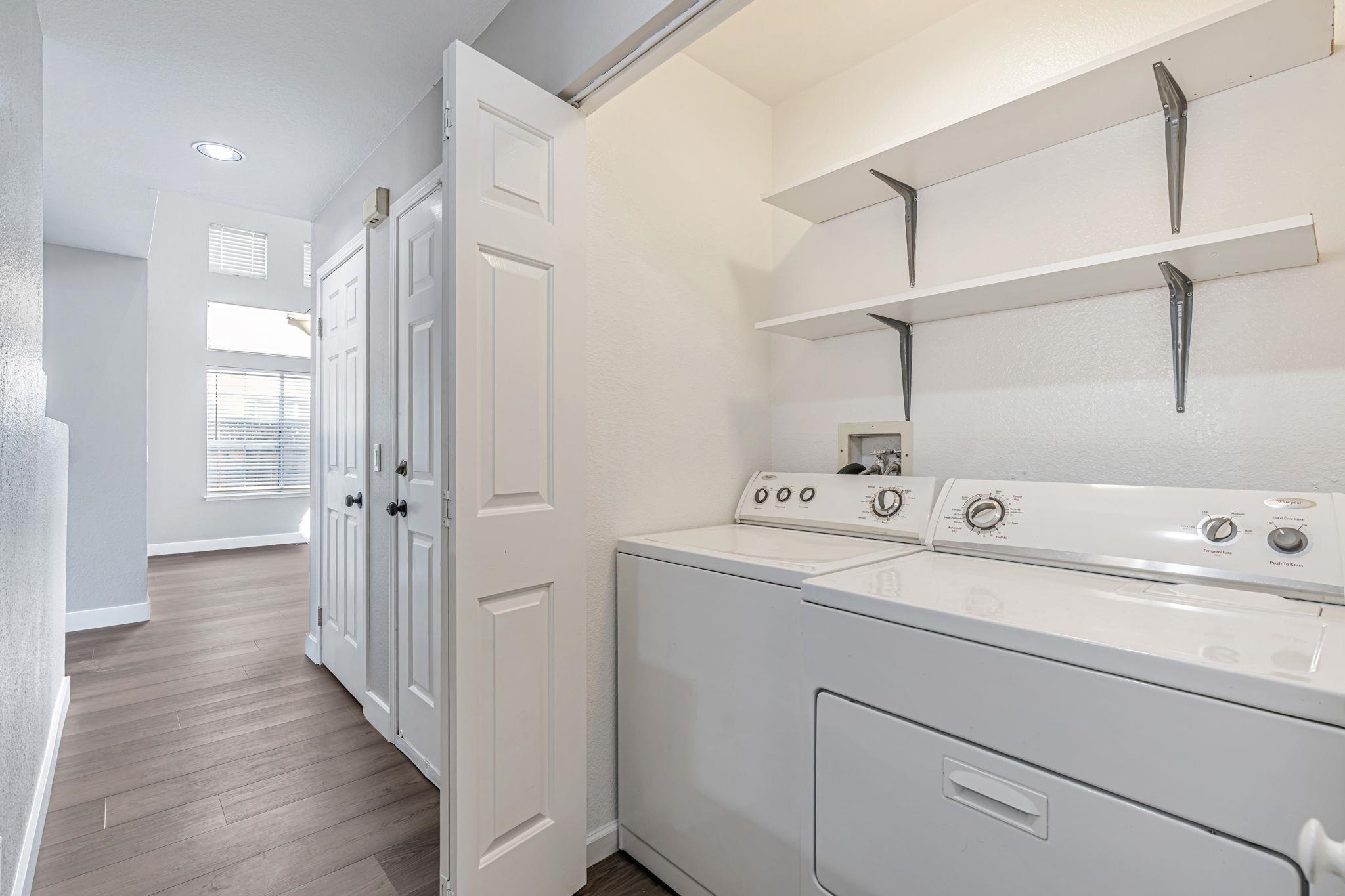 5052 Perry Way Antioch, CA 94531 - Photo 29 of 51 Laundry room with light wood-style flooring, washer and clothes dryer, and recessed lighting