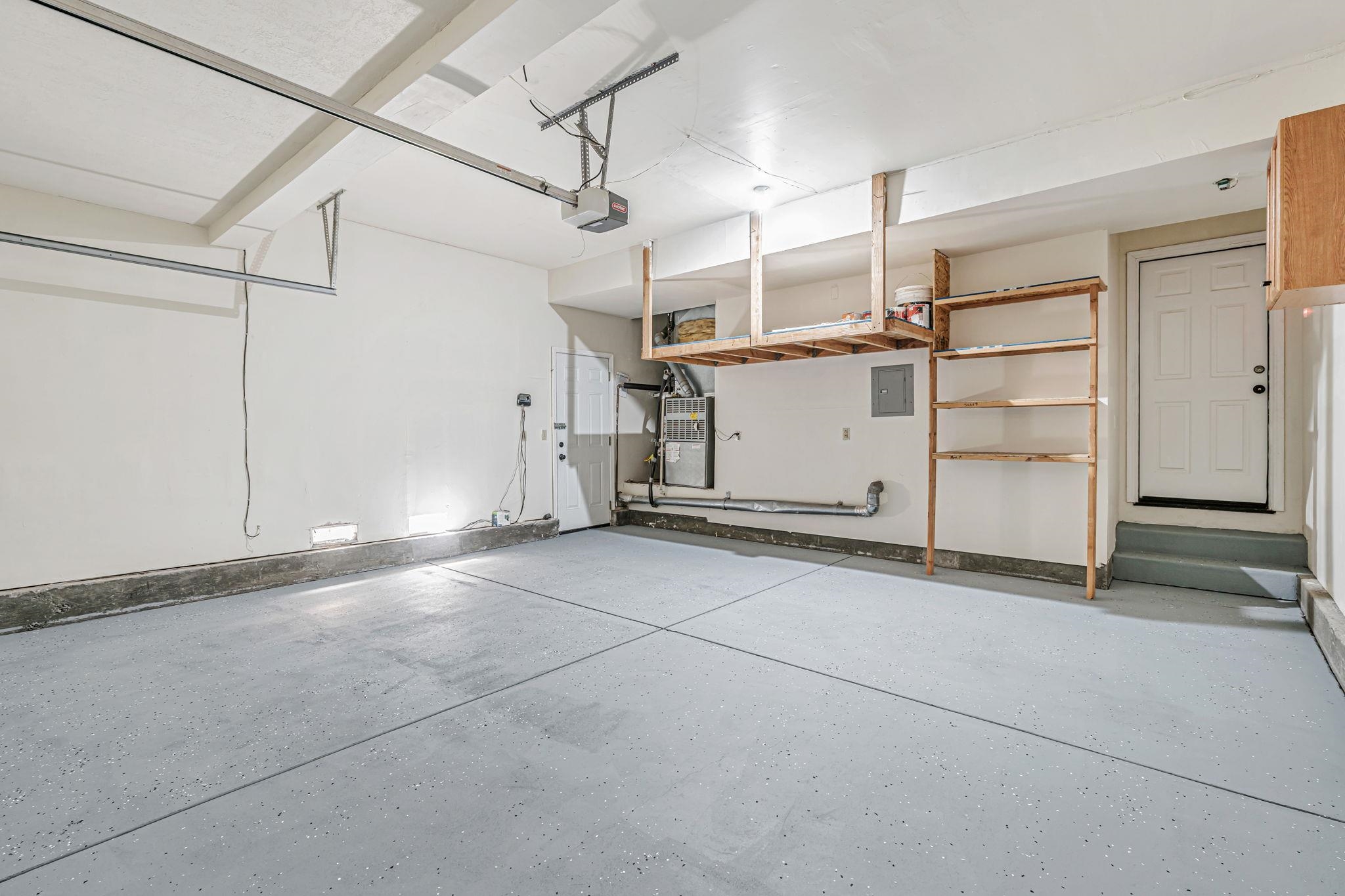 5052 Perry Way Antioch, CA 94531 - Photo 43 of 51 Garage with electric panel and a garage door opener