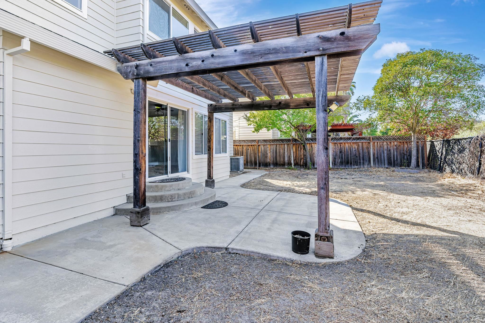 5052 Perry Way Antioch, CA 94531 - Photo 45 of 51 Fenced backyard with a pergola and a patio