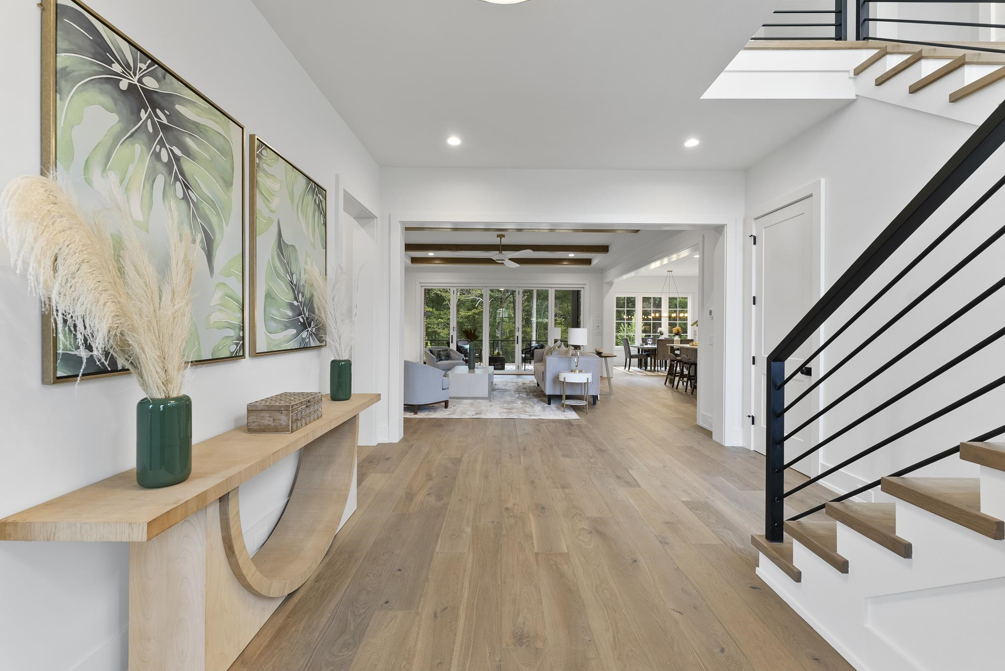 1625 Legacy Ridge Lane Wake Forest, NC 27587 - Photo 12 of 13 a living room with furniture a large window with table and chairs