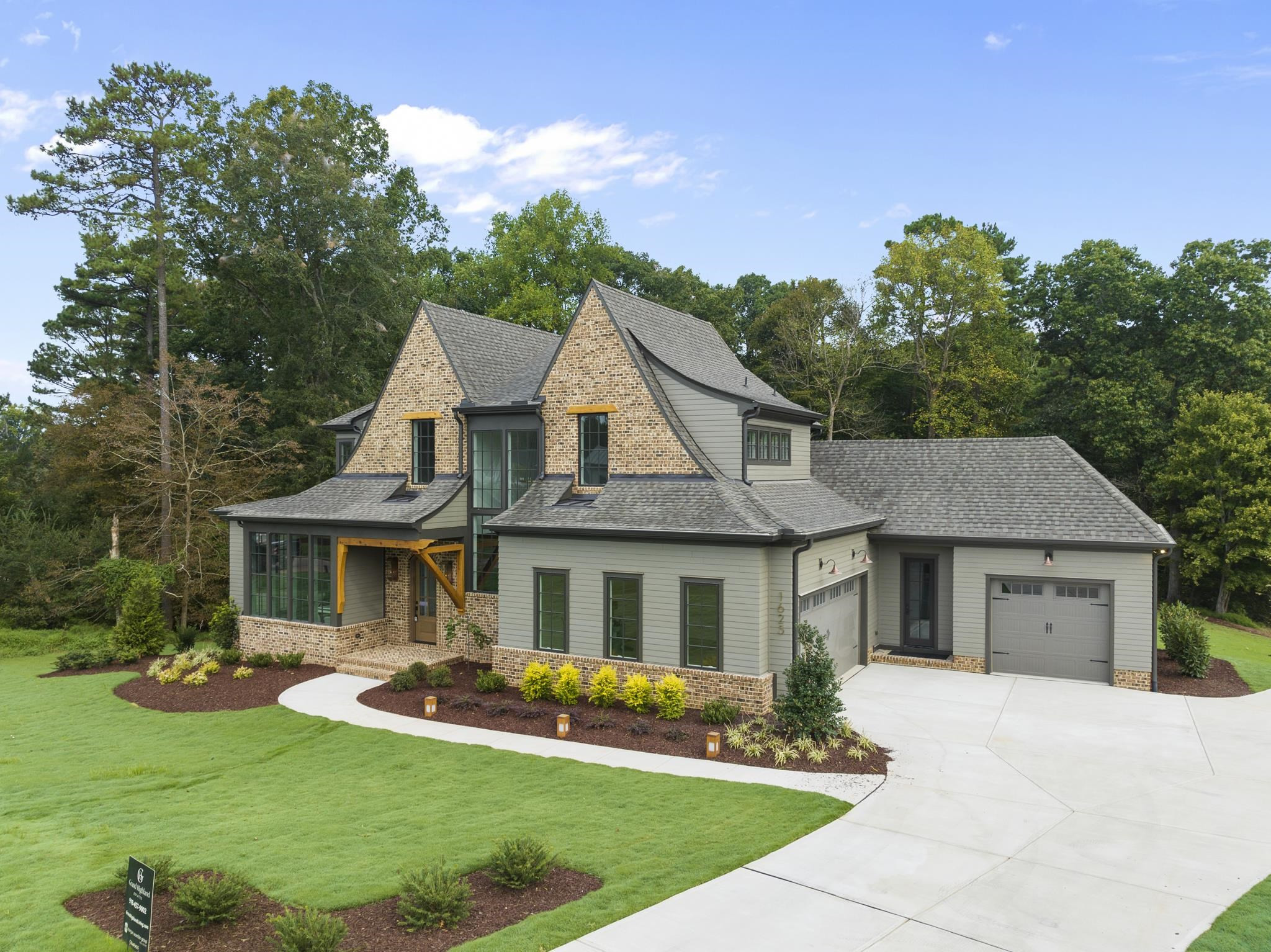 1625 Legacy Ridge Lane Wake Forest, NC 27587 - Photo 3 of 13 a front view of a house with yard porch and furniture
