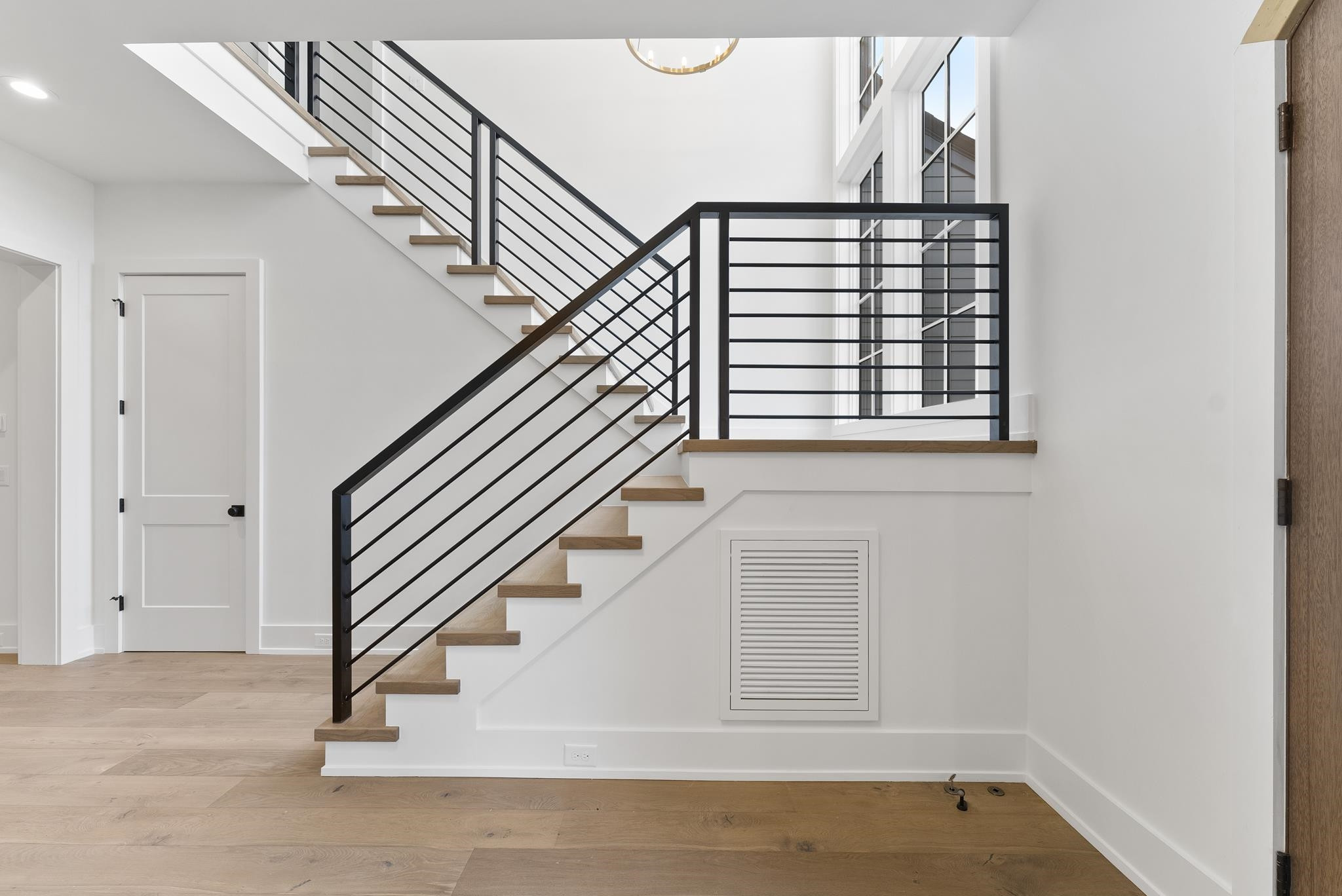 1625 Legacy Ridge Lane Wake Forest, NC 27587 - Photo 9 of 13 a view of entryway and hall with wooden floor
