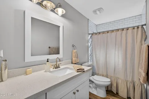 a kitchen with stainless steel appliances a stove and a refrigerator