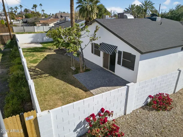 a house view with a garden space