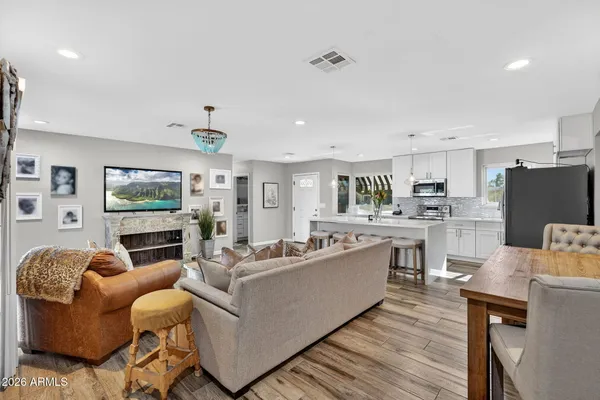 a view of a house with a backyard and a garden