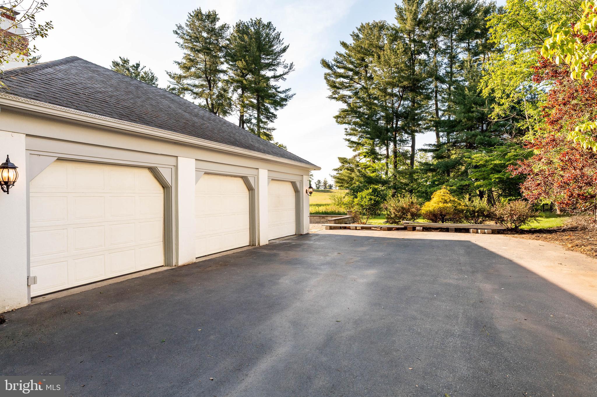 533 Gulph Road Wayne, PA 19087 - Photo 36 of 43 a view of a garage with a tree
