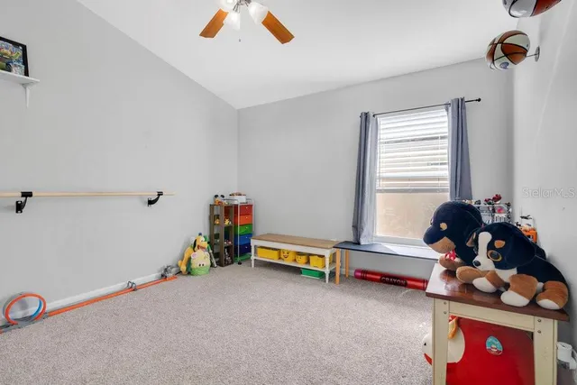 a room with toys and white walls