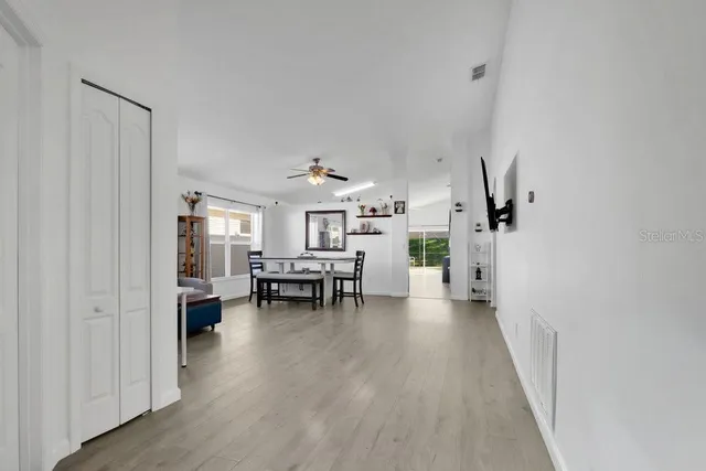 a view of a livingroom with furniture and fireplace