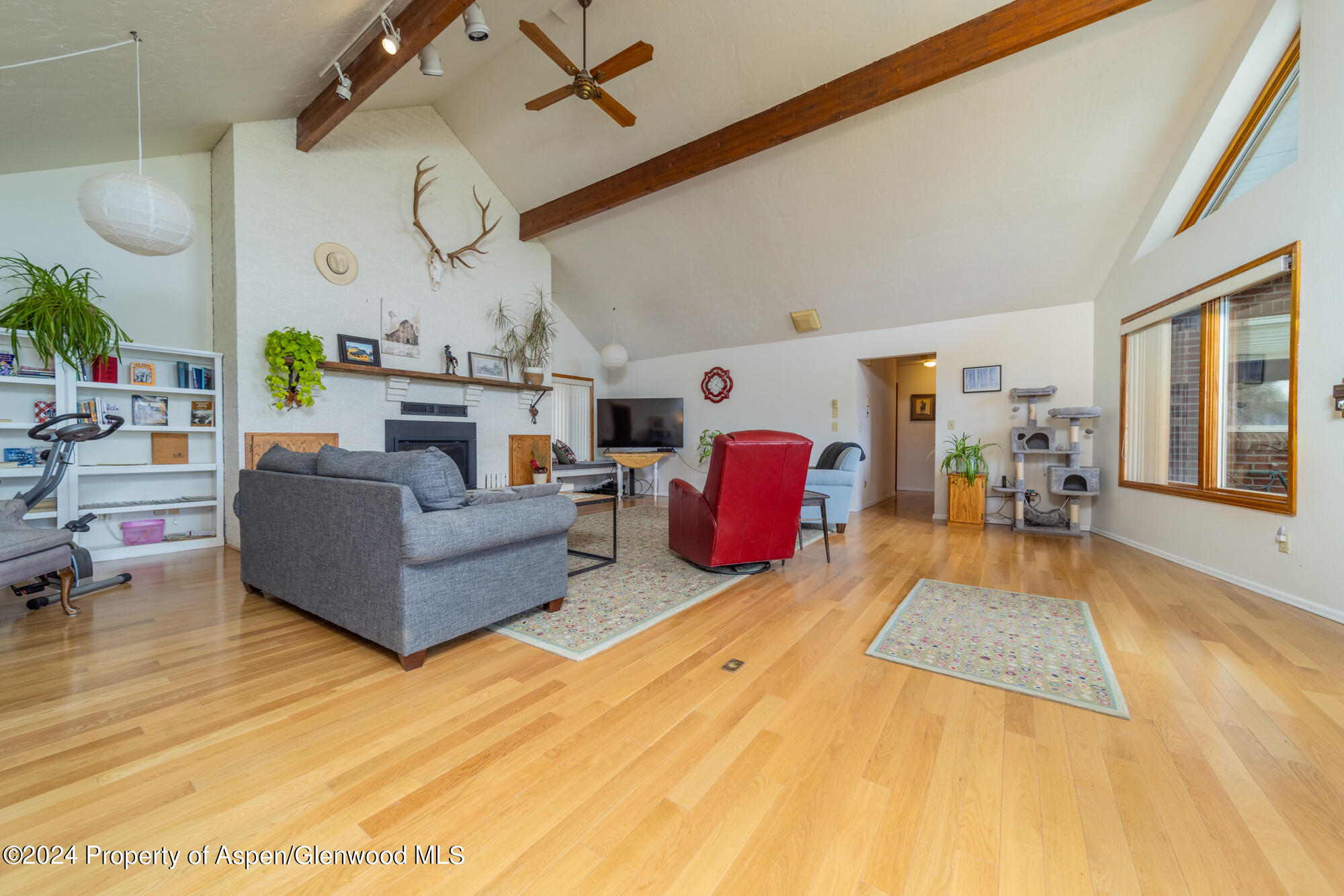 1501 14 Road Loma, CO 81524 - Photo 12 of 27 a living room with furniture and a large window
