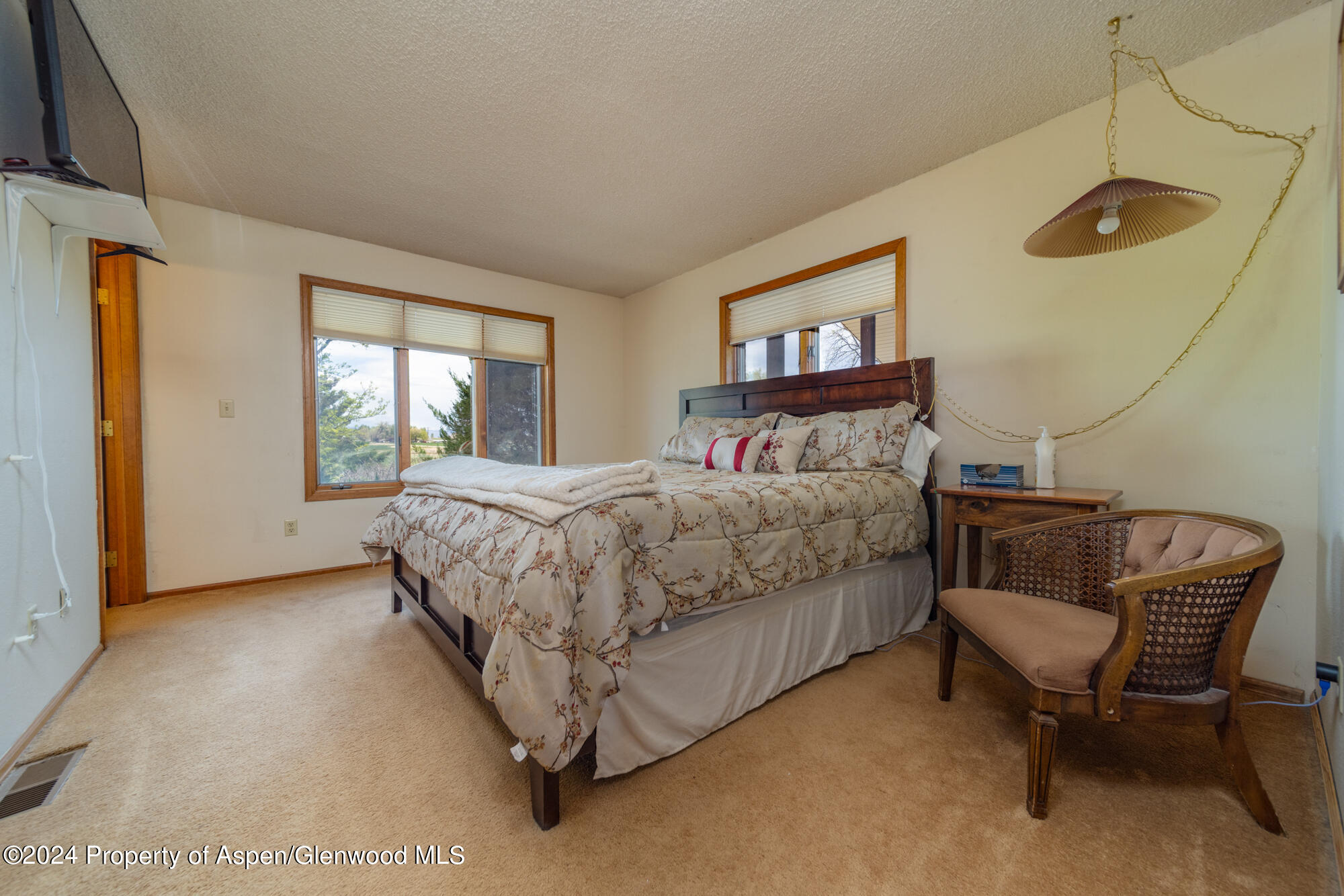 1501 14 Road Loma, CO 81524 - Photo 16 of 27 a bedroom with a bed and a window