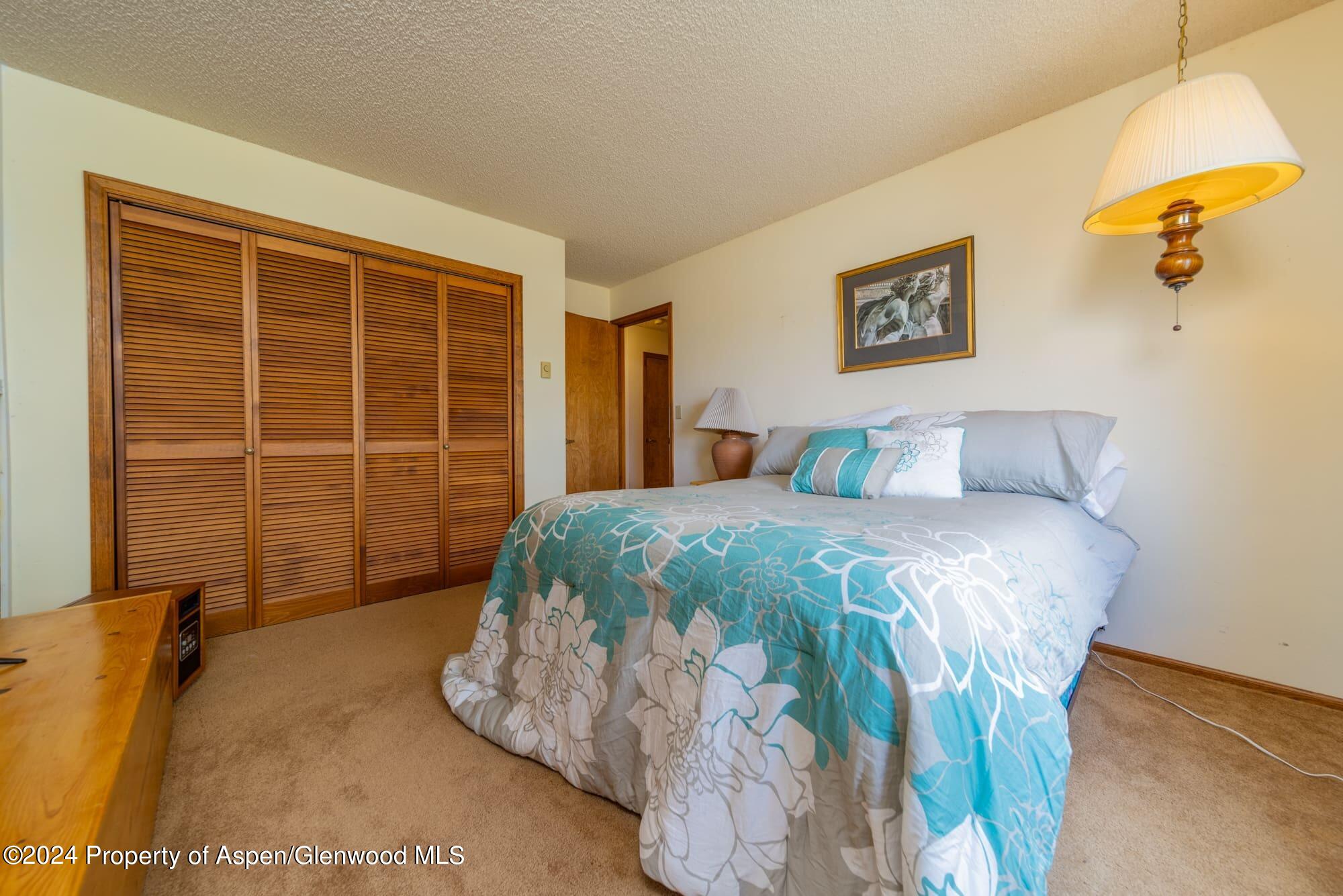 1501 14 Road Loma, CO 81524 - Photo 20 of 27 a bedroom with a bed and a window