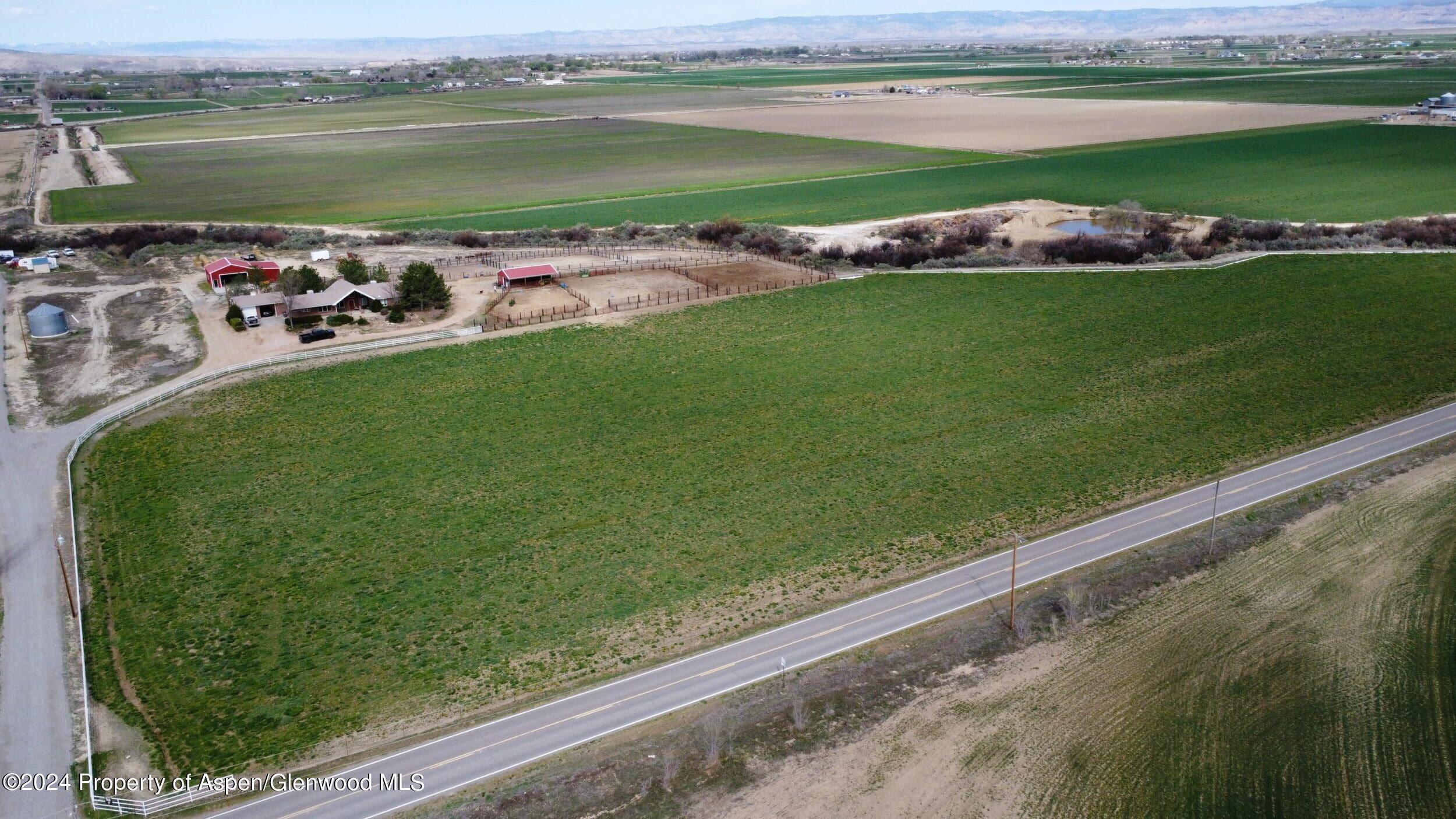 1501 14 Road Loma, CO 81524 - Photo 2 of 27 a view of a lake with a beach