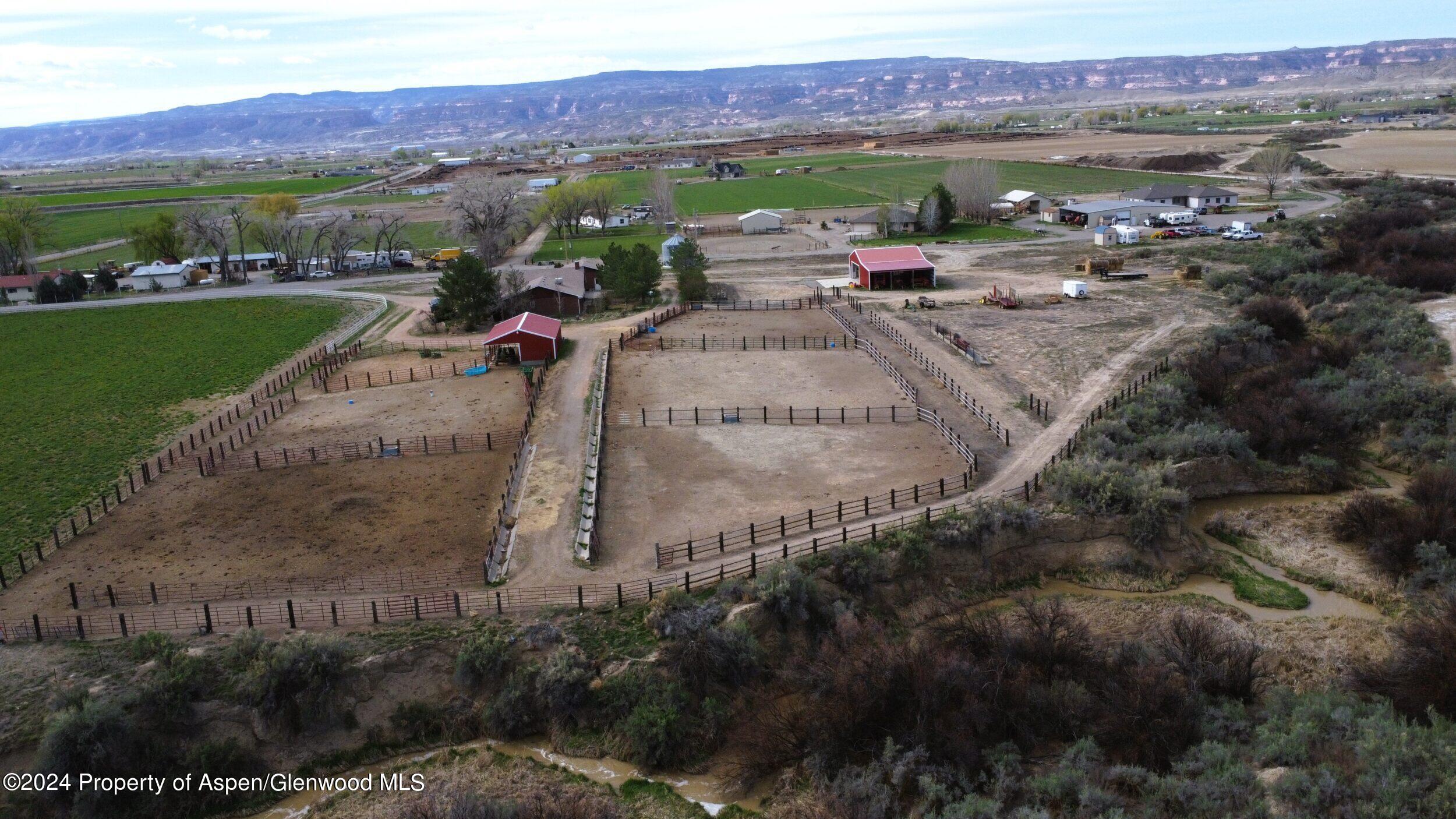 1501 14 Road Loma, CO 81524 - Photo 6 of 27 a view of a street with a mountain