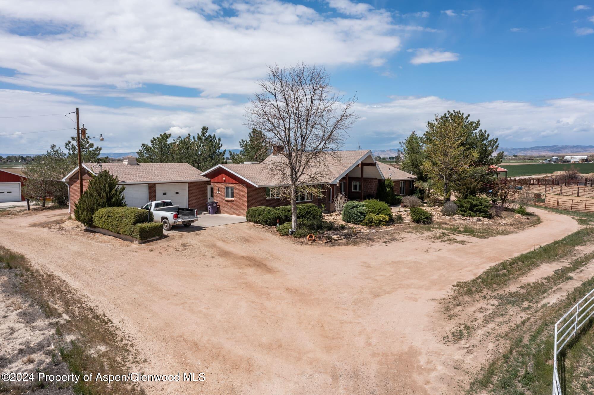 1501 14 Road Loma, CO 81524 - Photo 9 of 27 a view of a house with a street