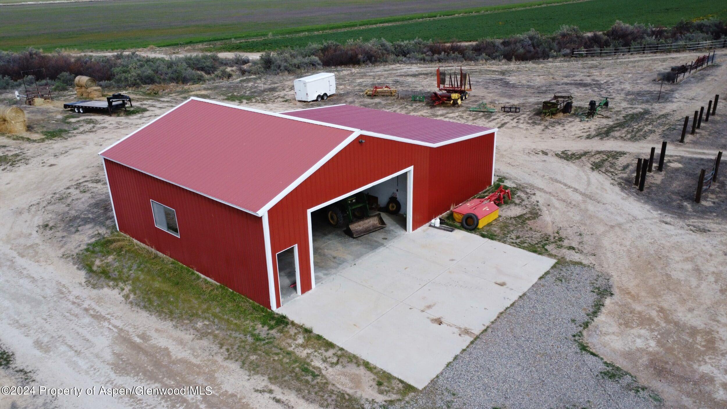 1501 14 Road Loma, CO 81524 - Photo 10 of 27 an aerial view of a house with a yard