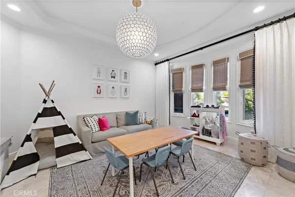 a spacious bedroom with a bed and furniture