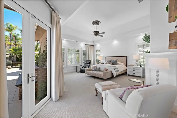 a living room with furniture and windows