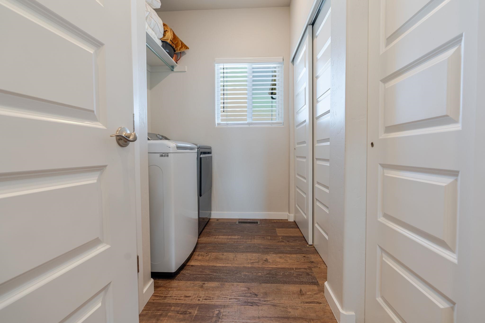 1301 M Road Loma, CO 81524 - Photo 11 of 32 a view of a hallway with wooden floor and staircase