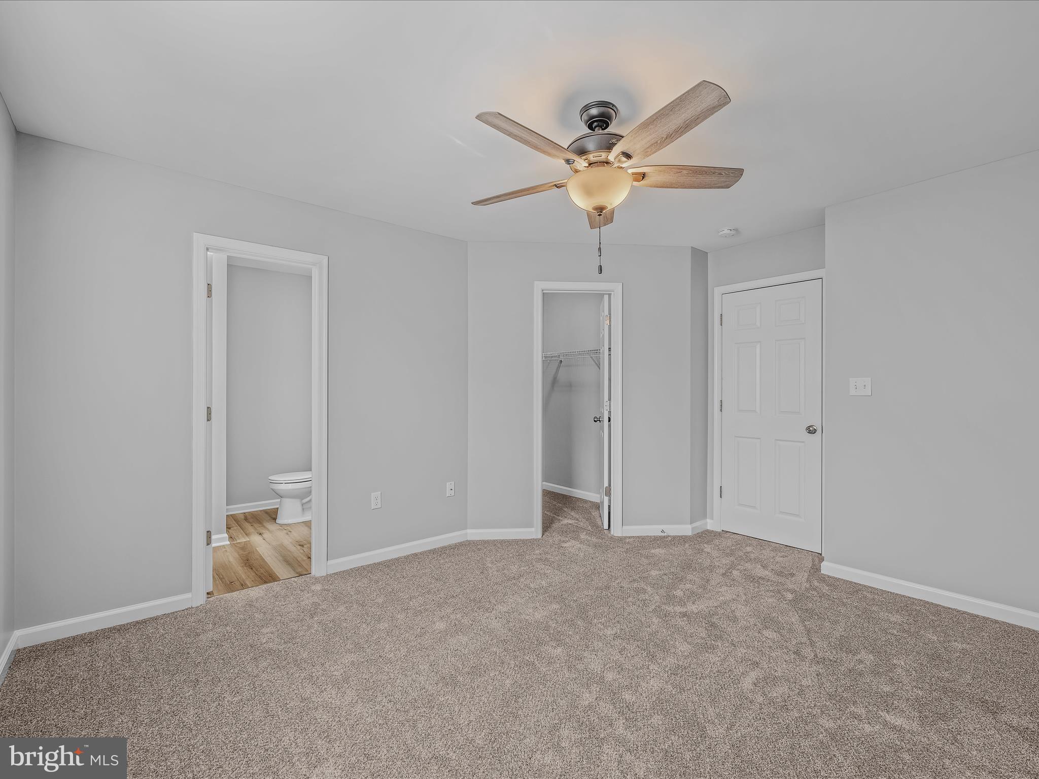 55 Stix Lane Inwood, WV 25428 - Photo 16 of 41 a view of an empty room and chandelier fan