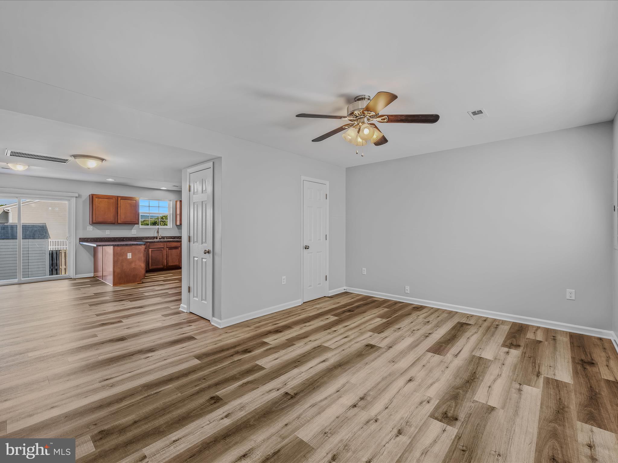 55 Stix Lane Inwood, WV 25428 - Photo 5 of 41 a view of livingroom with hardwood floor and a ceiling fan