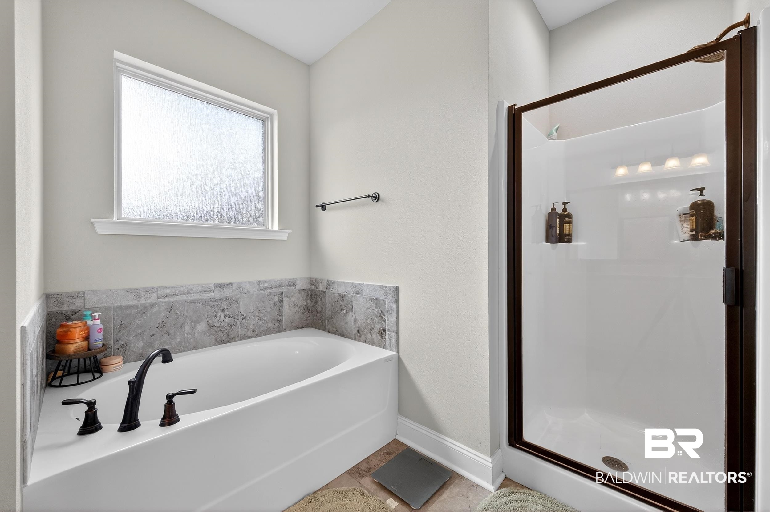 1084 Stella Road Foley, AL 36535 - Photo 22 of 31 Full bath with a stall shower and a bath