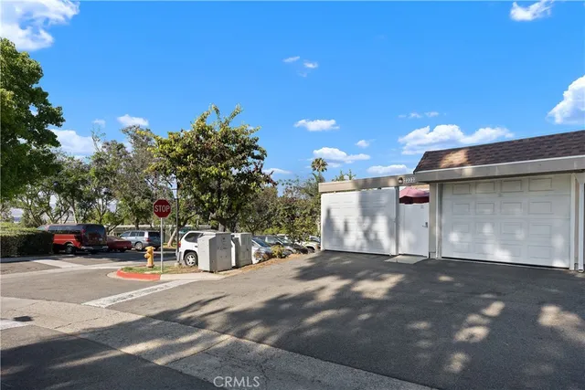 a view of a street with cars