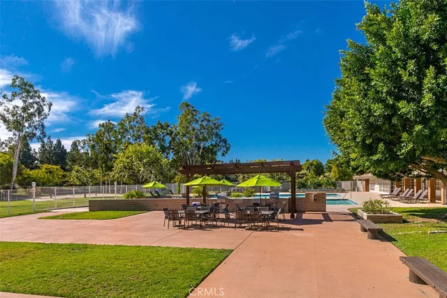 a aerial view of a house with a yard