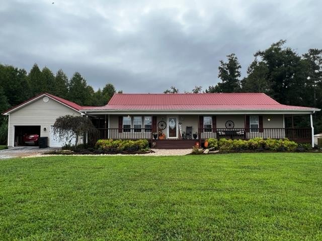 670 Armstrong Road Southeast Cleveland, TN 37323 - Photo 1 of 16 a front view of house with yard and green space