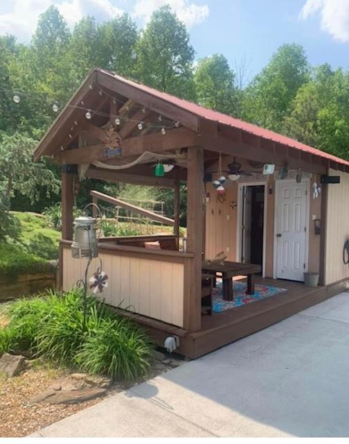 670 Armstrong Road Southeast Cleveland, TN 37323 - Photo 14 of 16 a front view of house with a garden